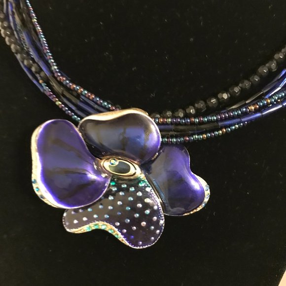 Chico's Jewelry - CHICOS MULTISTRAND MICRO BEAD CHOKER WITH A METAL ENAMEL FLOWER DESIGN